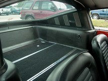 The back seat with the rear seat folded down.